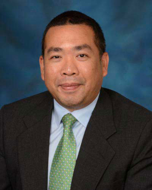Dr. Man E. Charurat