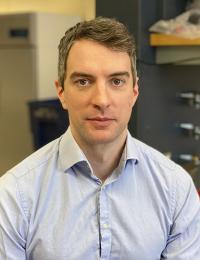 headshot photo of Tim Luetkens, MD